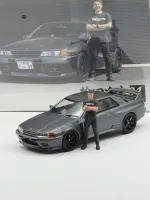 Mini GT 1:64 Nissan Skyline GT-R (R32) Nismo Gunmetal w/ Matsuda Figure