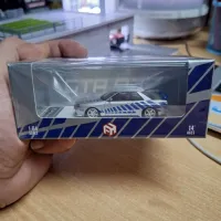 Focal Horizon 1:64 Nissan Skyline GT-R R32 Nismo S-Tune Silver / Blue Stripe