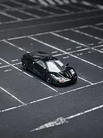 Xcartoys x POP RACE 1:64 McLaren F1 - JET BLACK
