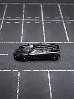 Xcartoys x POP RACE 1:64 McLaren F1 - JET BLACK